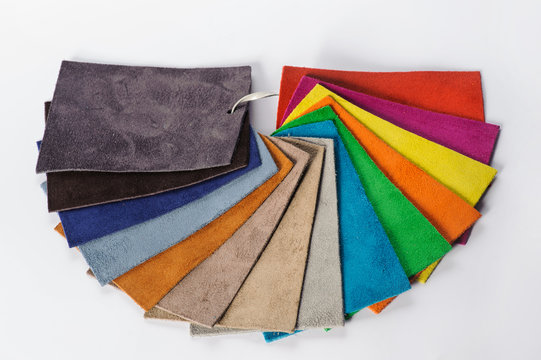 Natural italian leather multicoloured samples on white background.