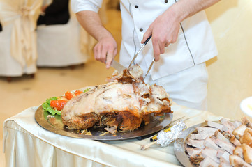 Cutting Pork on Tray