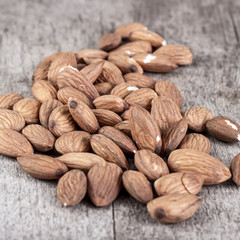 roasted almonds on wooden table