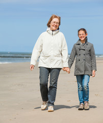 Family walking on the beach