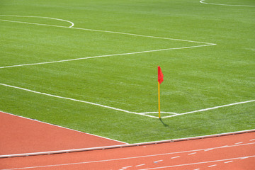 Flag Pole At The Corner Of A Football Field
