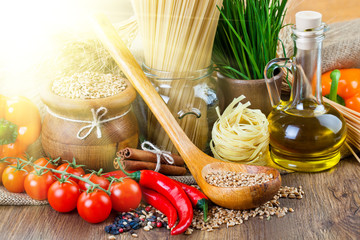 The composition of the pasta and vegetables on background