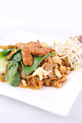 Asian stir fried flat rice noodles. Pad se ew with chicken.