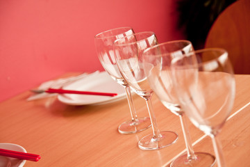 Tables set for meal in restaurant.