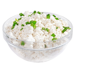 Fresh cottage cheese (curd) in glass bow, isolated on white back