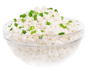 Fresh cottage cheese (curd) in glass bow, isolated on white back