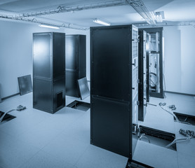 server cabinets inside data center room