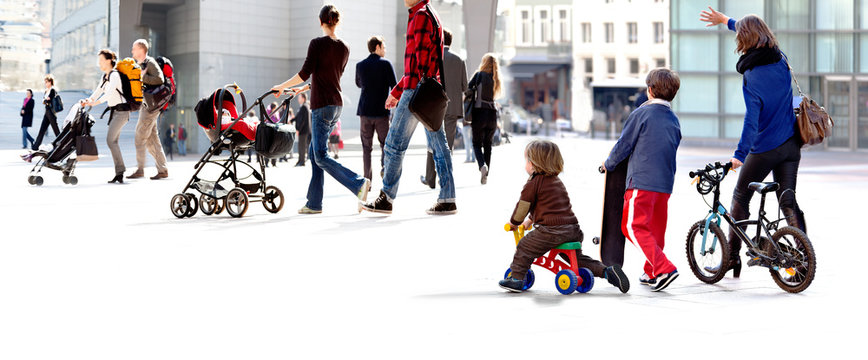 A large group of parents with children.