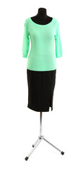 Turquoise blouse and black skirt on mannequin isolated on white