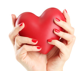 Obraz premium Red heart in woman hands, isolated on white