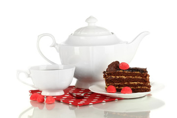 Teapot, cup of tea and delicious cake isolated on white