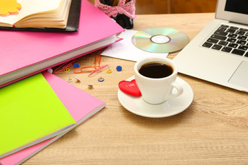 Cup of coffee on office desktop close-up