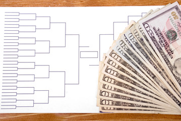 Fototapeta premium March Madness Bracket and Fanned Money on Right