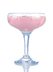 Glass of yoghurt dessert with berries, isolated on white