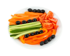 Assorted raw vegetables sticks in plate isolated on white