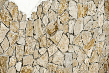 Background of stone wall. Brown texture of stone wall