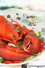 Red lobster on platter on serving table close-up