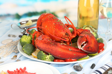 Red lobster on platter on serving table close-up