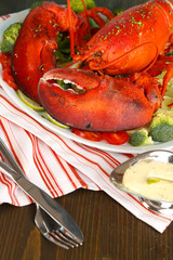 Red lobster on platter on table close-up