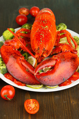 Red lobster on platter on table close-up