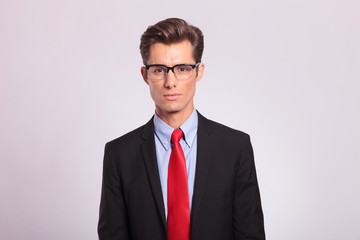 handsome young business man with glasses