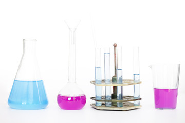 Chemical flasks with reagents on table