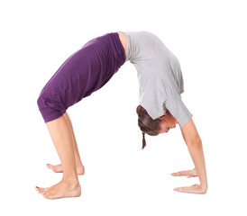 Young woman doing yoga exercise 