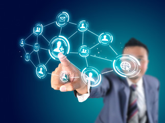 Business man touching digital virtual of social technology