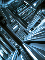 Obraz premium Industrial zone, Steel pipelines and cables in blue tones