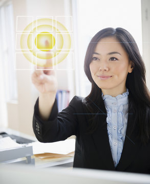 Japanese Businesswoman Touching Digital Screen