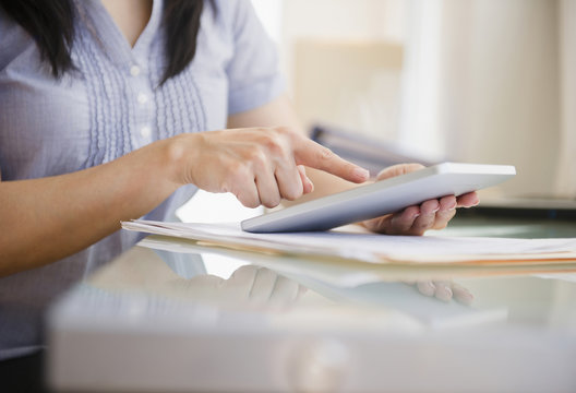 Japanese Woman Using Digital Tablet