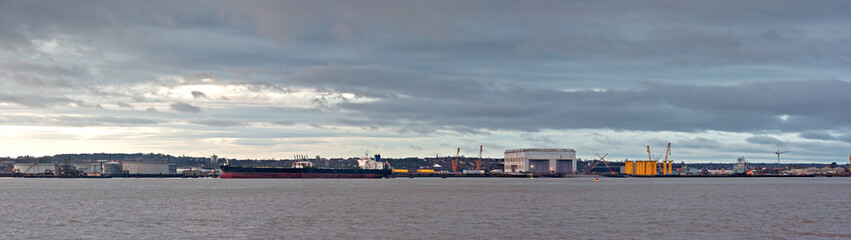 Oil tanker unloading at terminal