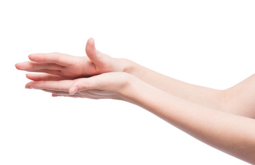 Woman rubs hand cream