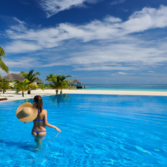 Woman at poolside