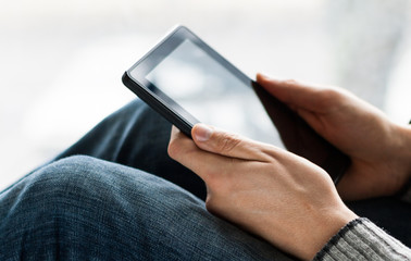 A man holding a tablet pc
