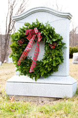 Christmas wreath in a cemetery