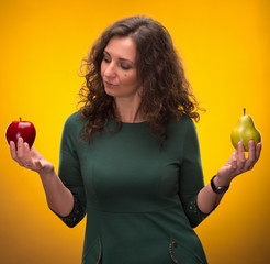 beauty brunette with apple and pear