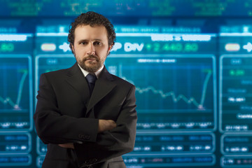 businessman with beard and black suit in the stockmarket, money