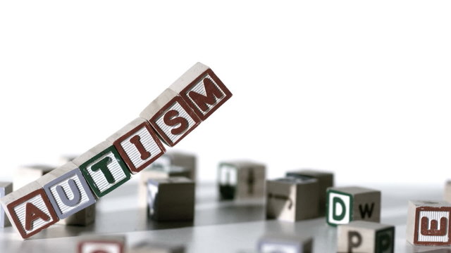 Blocks spelling autism falling over