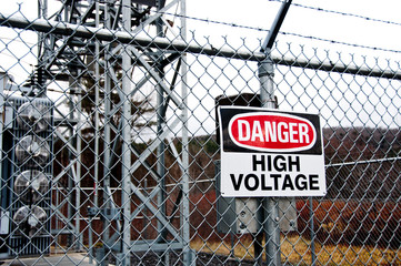 Substation danger sign on a fence