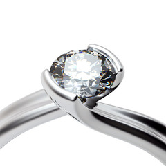 Wedding ring with diamond on white background. Sign of love