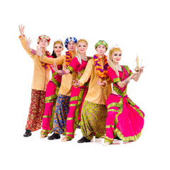 dancers dressed in Indian costumes posing