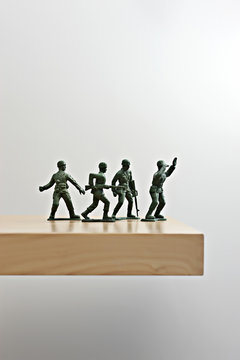 Plastic soldiers on table top