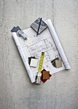 Blueprints, color swatches and measuring tape