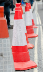Line of red traffic cones