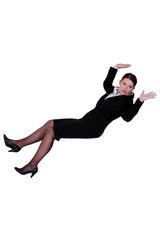 Businesswoman falling backwards