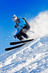 Man Skiing Against Blue Sky - 50192458