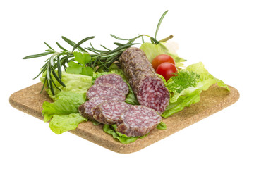 Salami with rosemary, salad and tomatoes