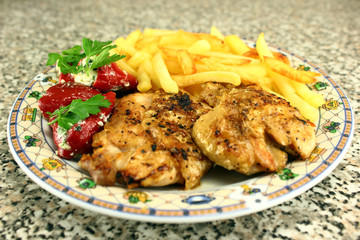 Grilled chicken steak with french fries