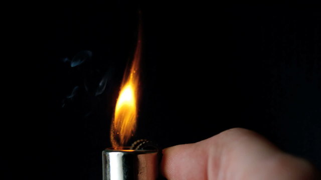 Man lighting up a lighter